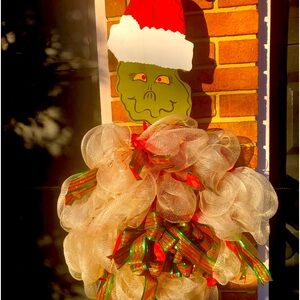 Festive Grinch Holiday Wreath with Red and Green Accents